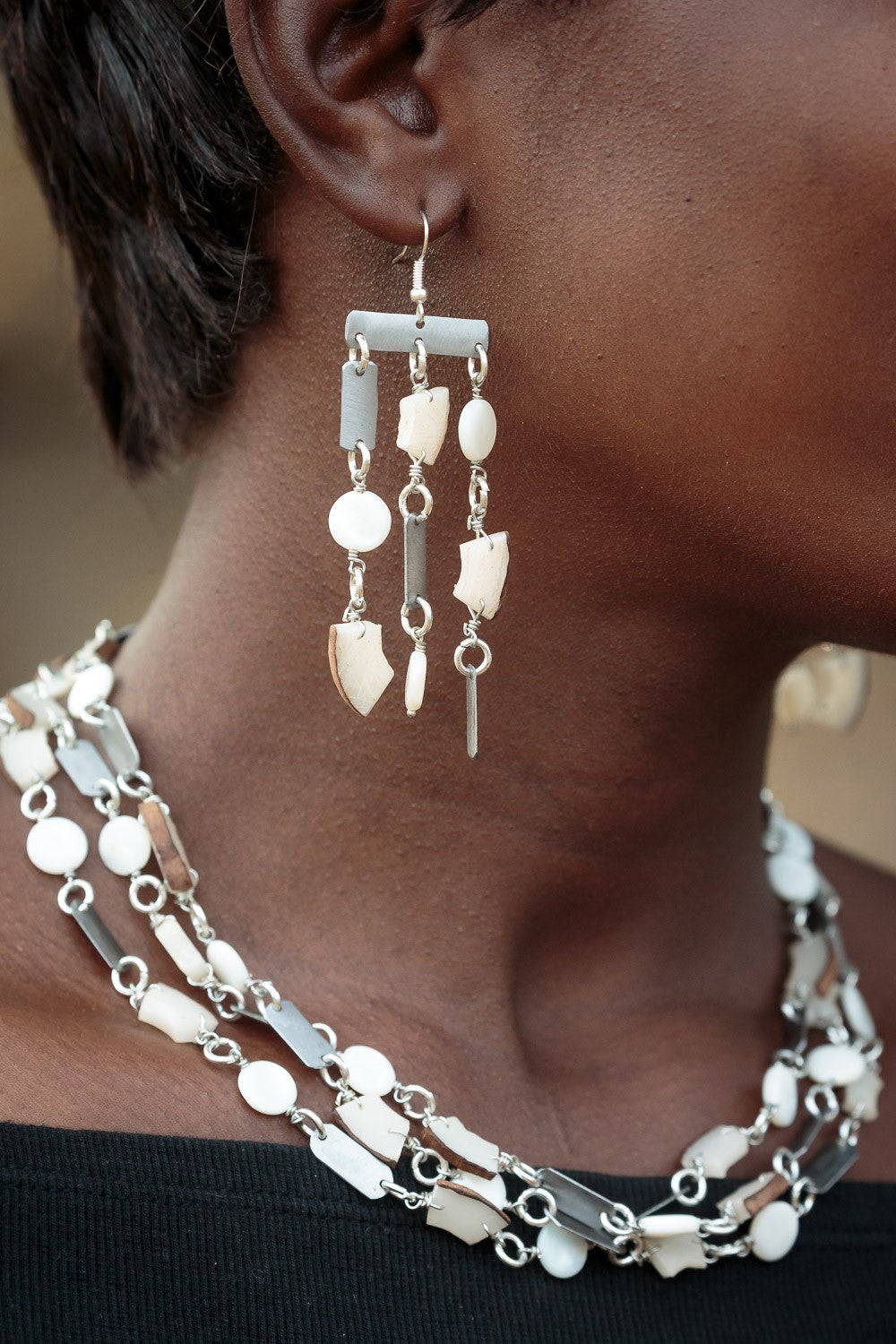 Rhino conservation snare & vegetable ivory necklace