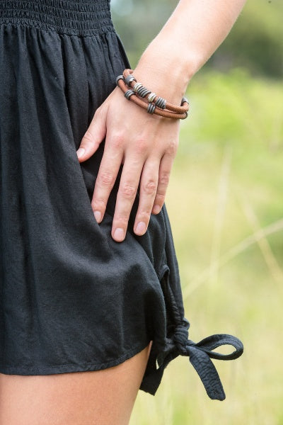 Leather snare bracelet with metal beads